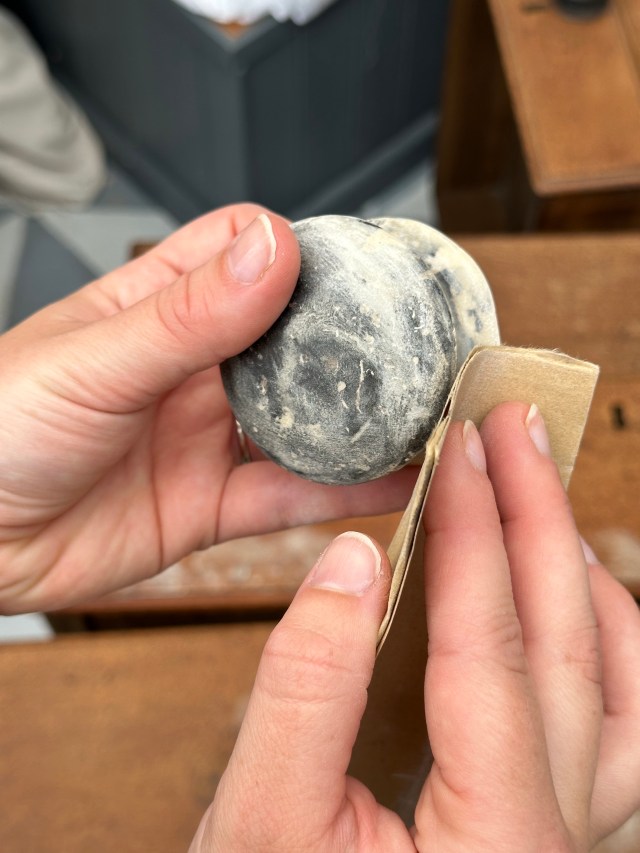 sanding wooden knobs