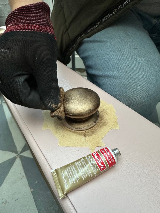 Antique gold rub and buff on knobs