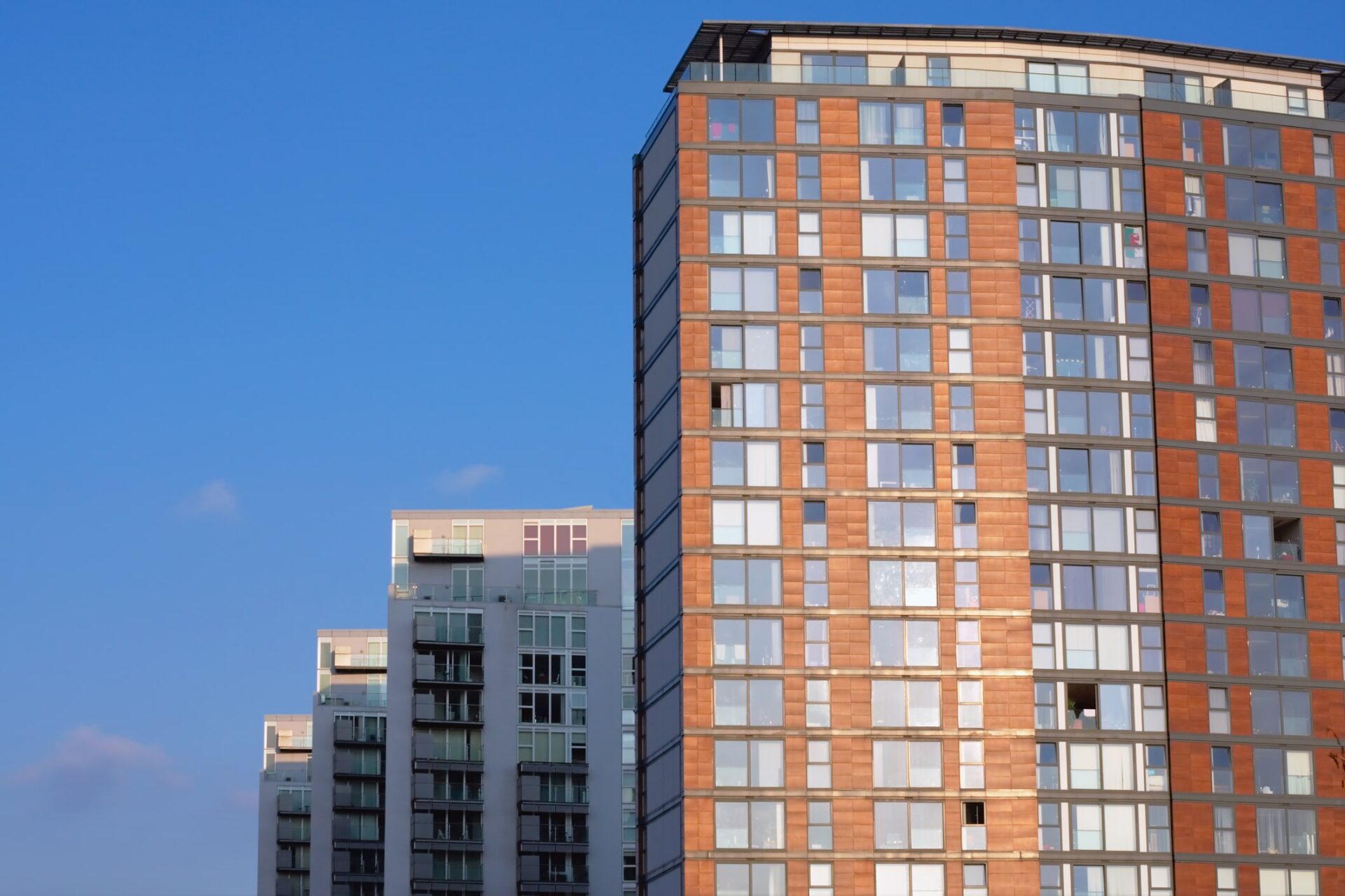 How is building safety impacting insurance premiums in construction?