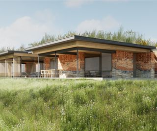 A Paragraph 84 single storey home with brick walls and a patio area leading onto a lawn
