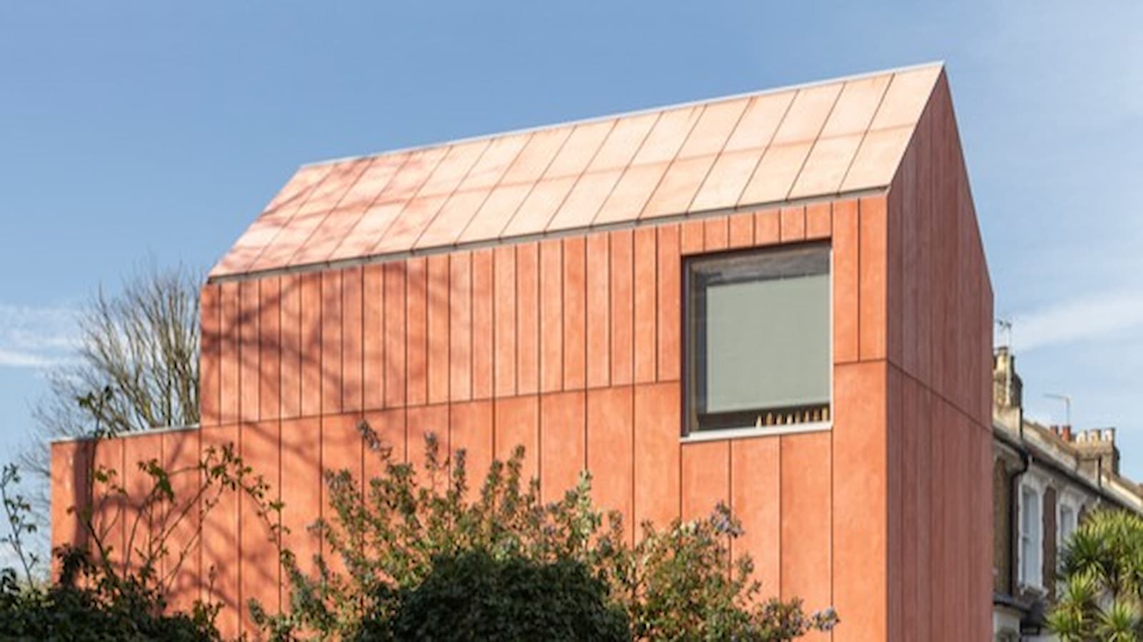 Kevin McCloud hails ‘happy ending’ as family builds red home on 66m² garage plot after tragedy