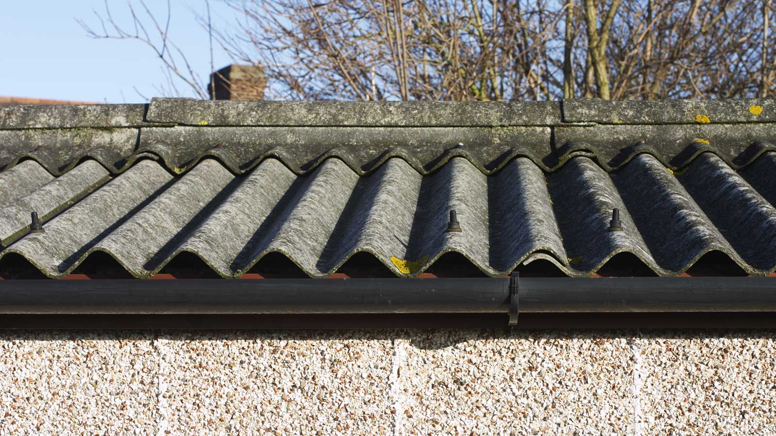How to deal with asbestos in a garage roof