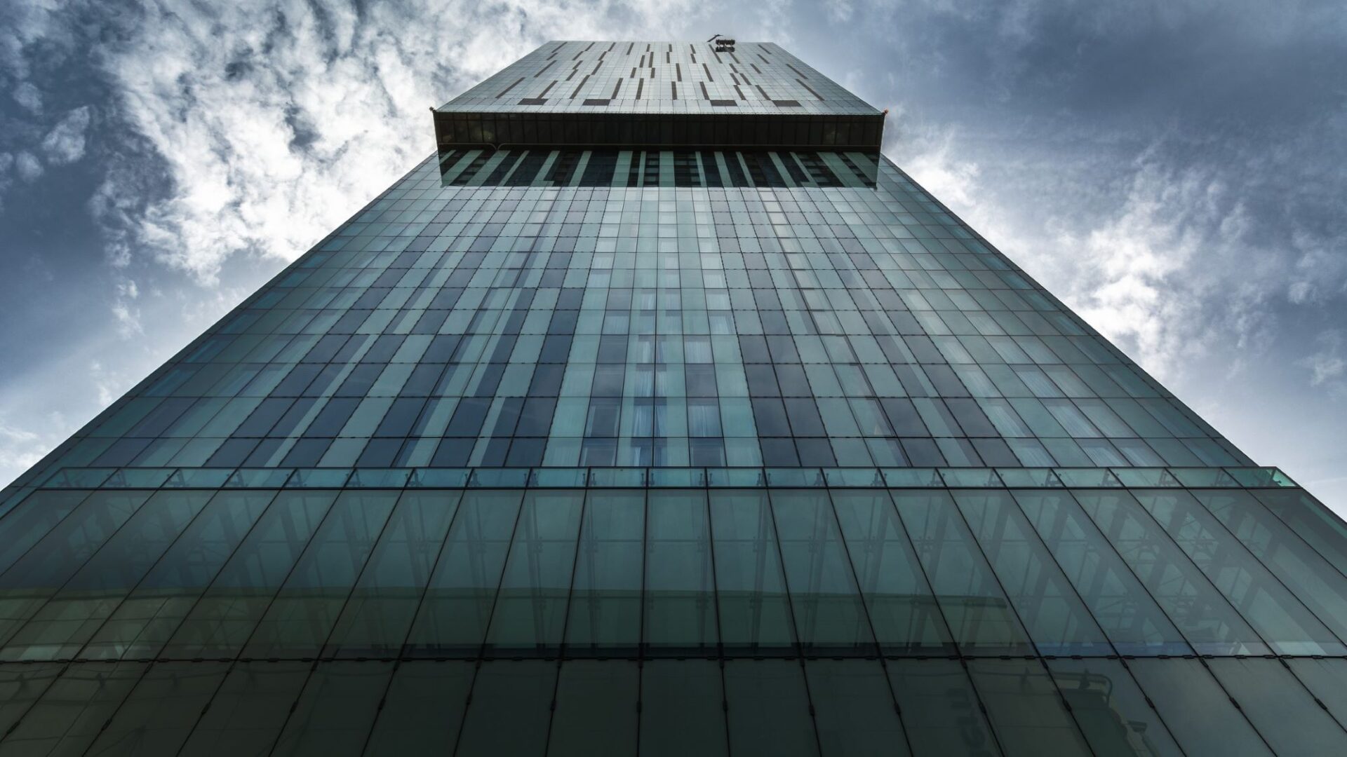 What makes building facades whistle and hum?