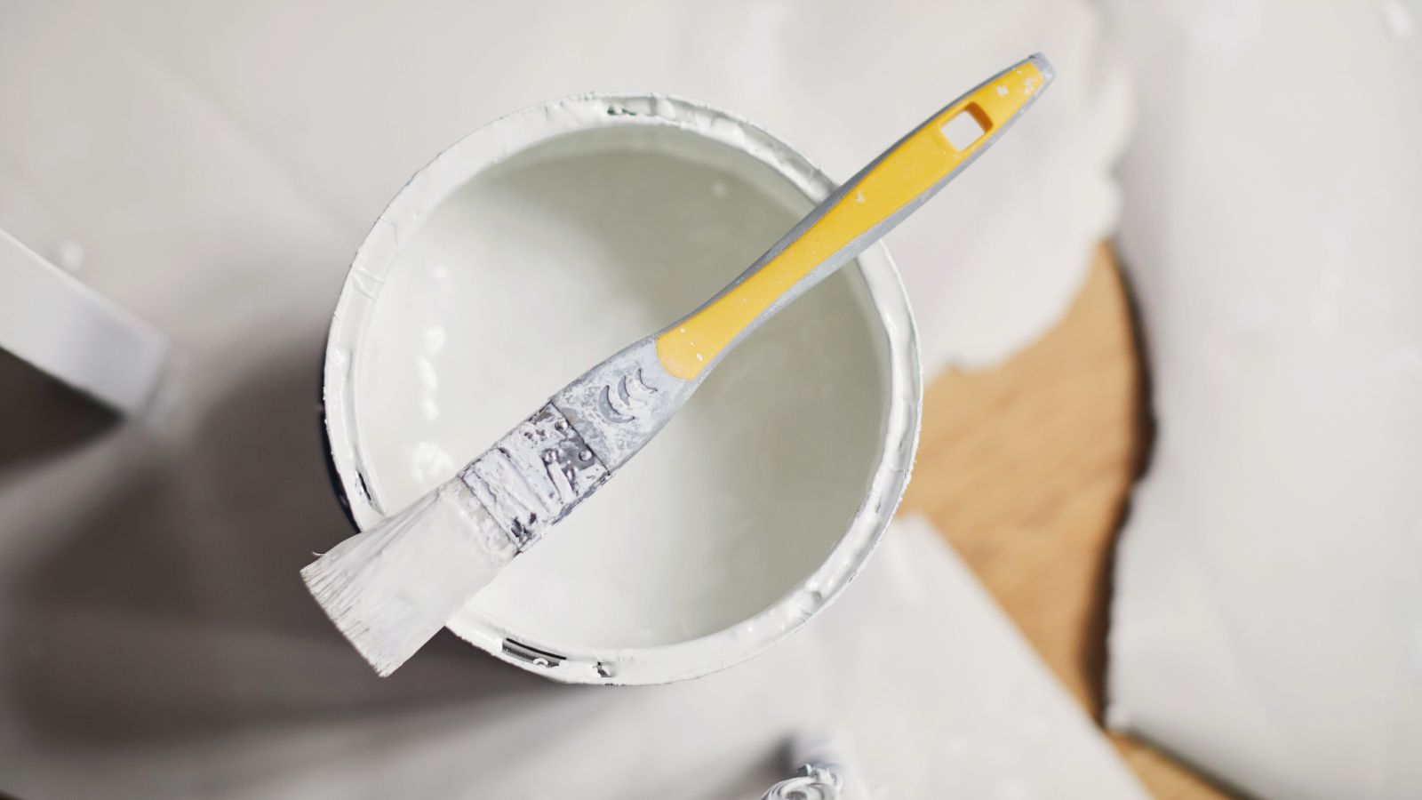 Overhead view of painting materials on the floor
