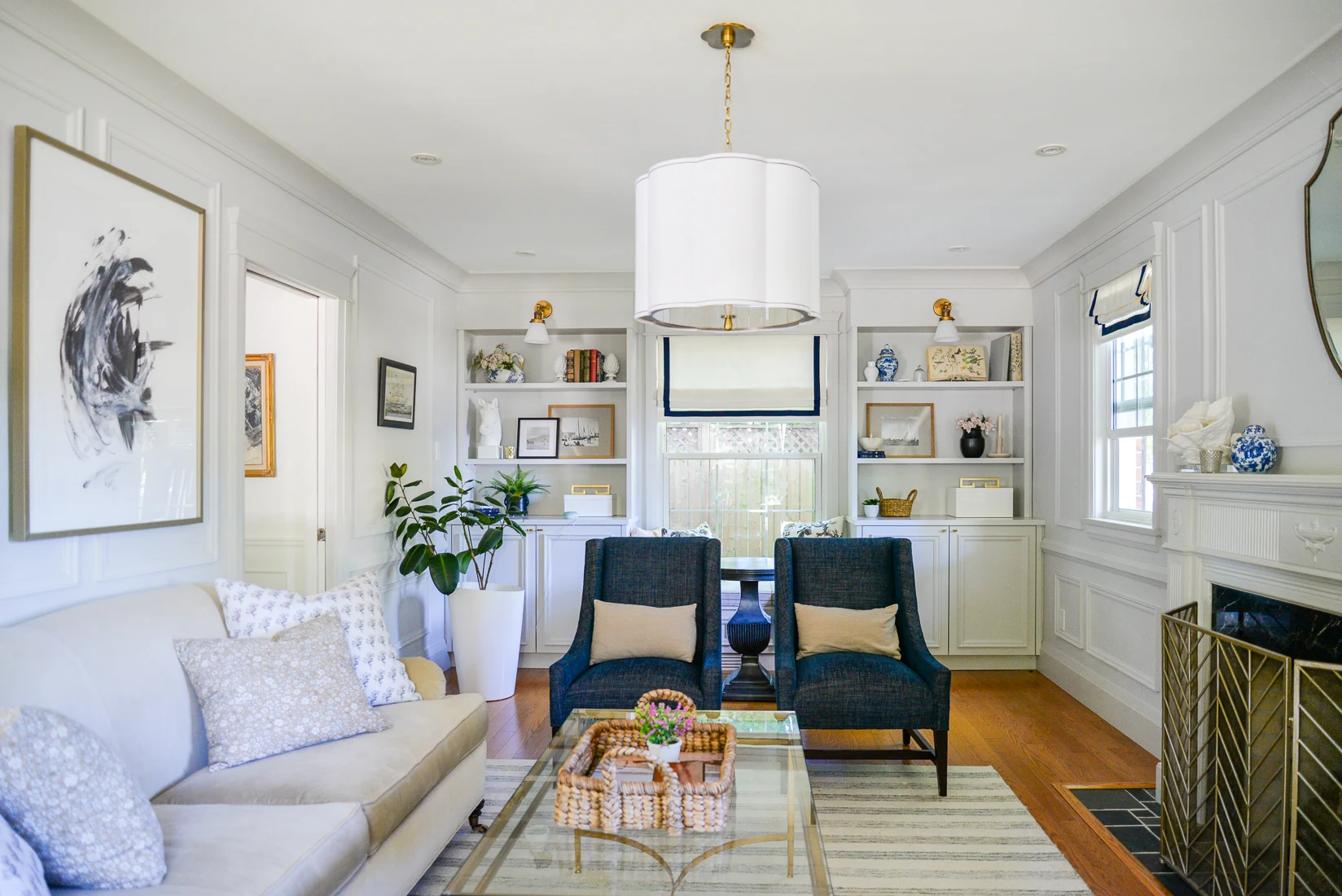 traditional living room fireplace layout with sofa and accent chairs