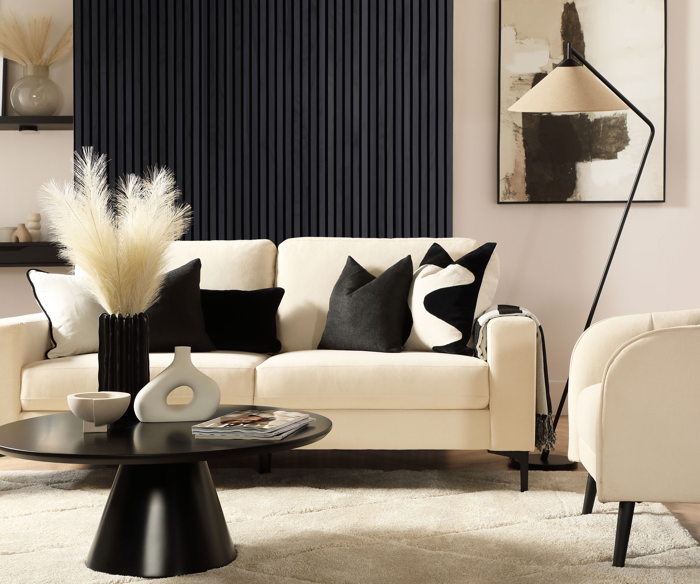 black and white living room with black slatted wall panelling