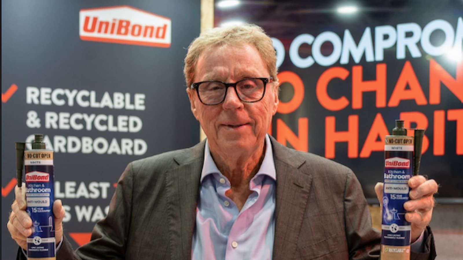 Harry Redknapp holding two sealants for Unibond