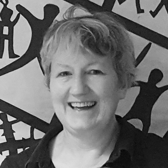 black and white headshot of female smiling