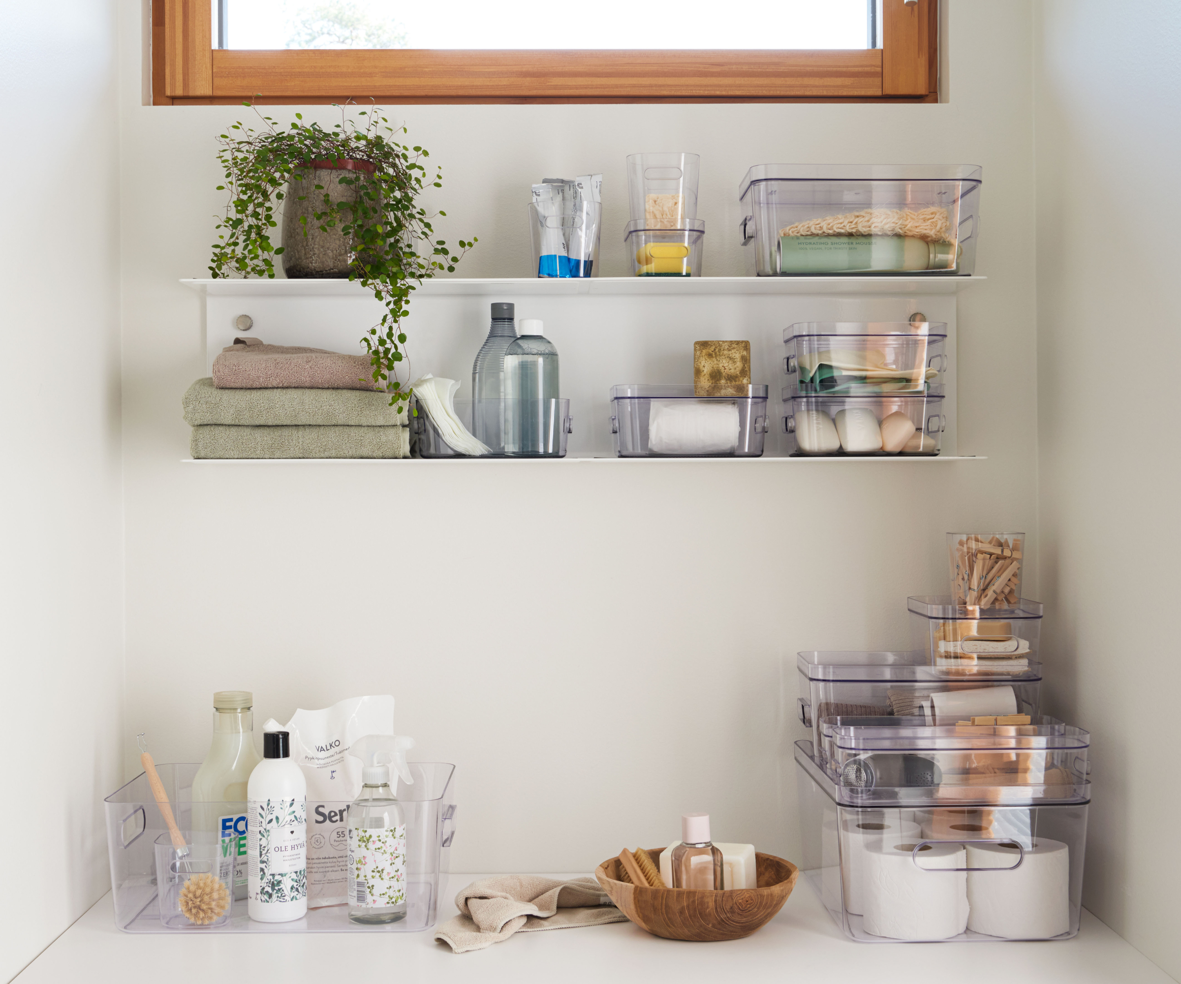 bathroom shelves with clear storage containers