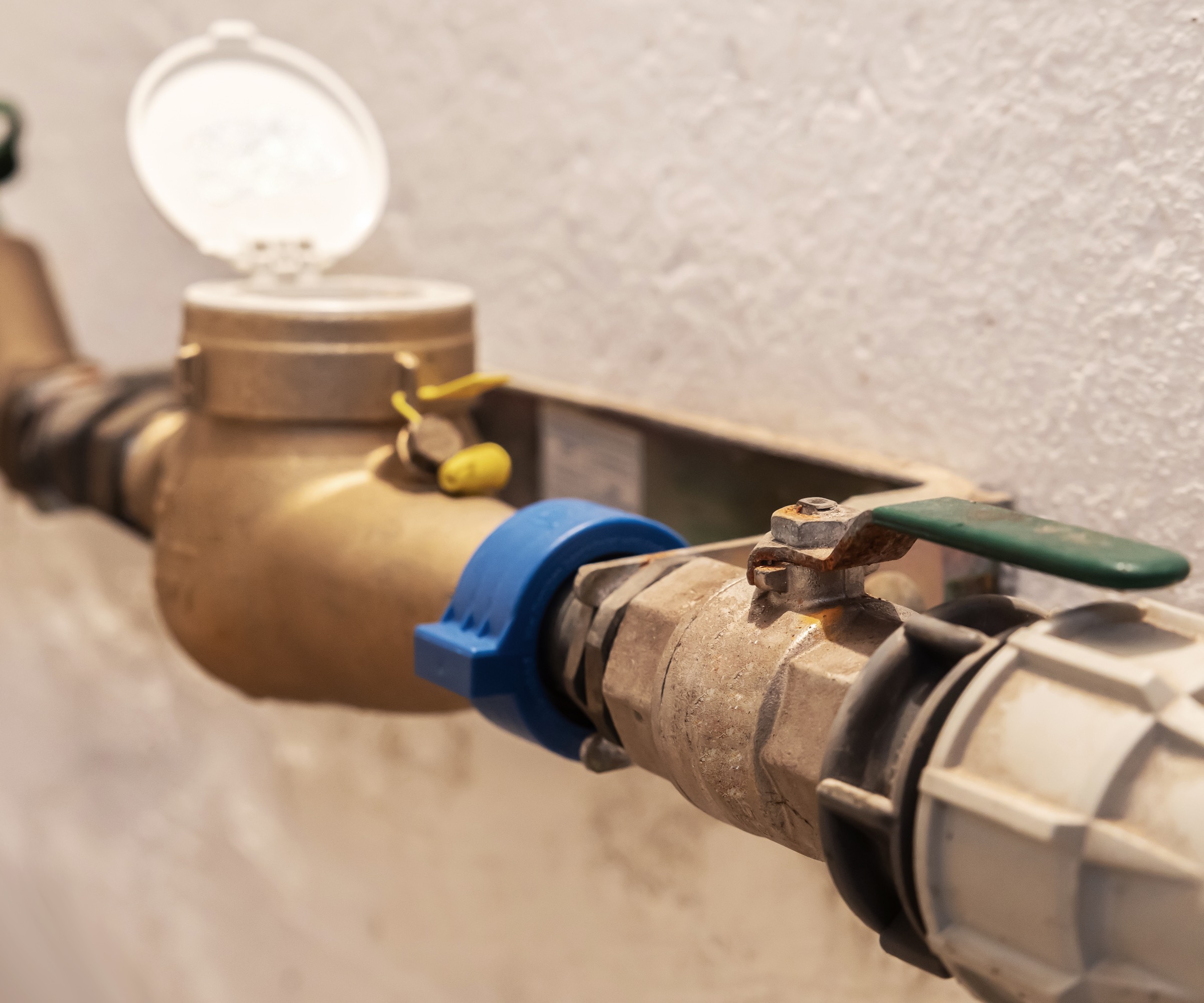 External stop cock next to rendered wall