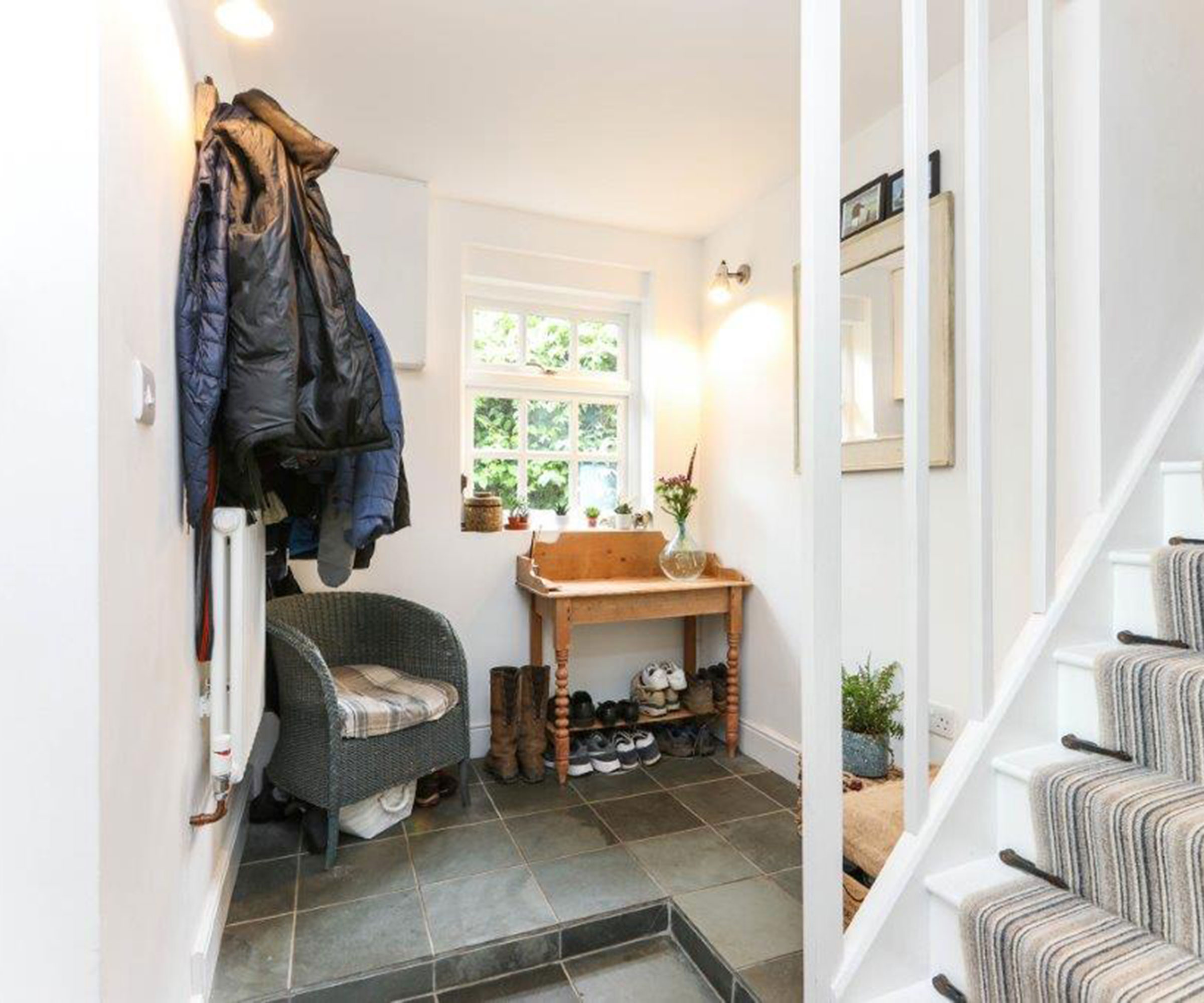 small hallway with slate flooring