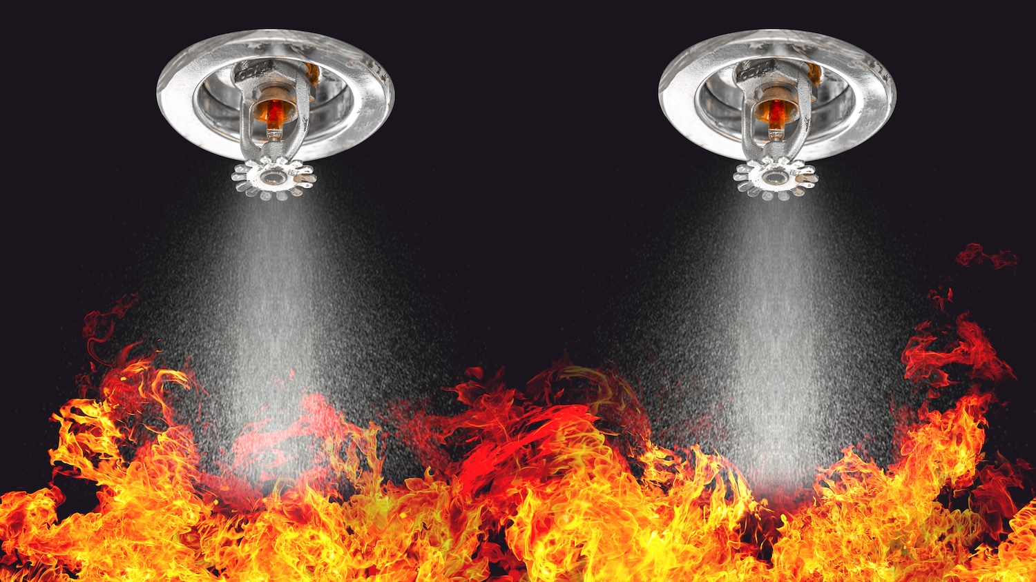 Image of sprinklers working over fire for fire safety design story