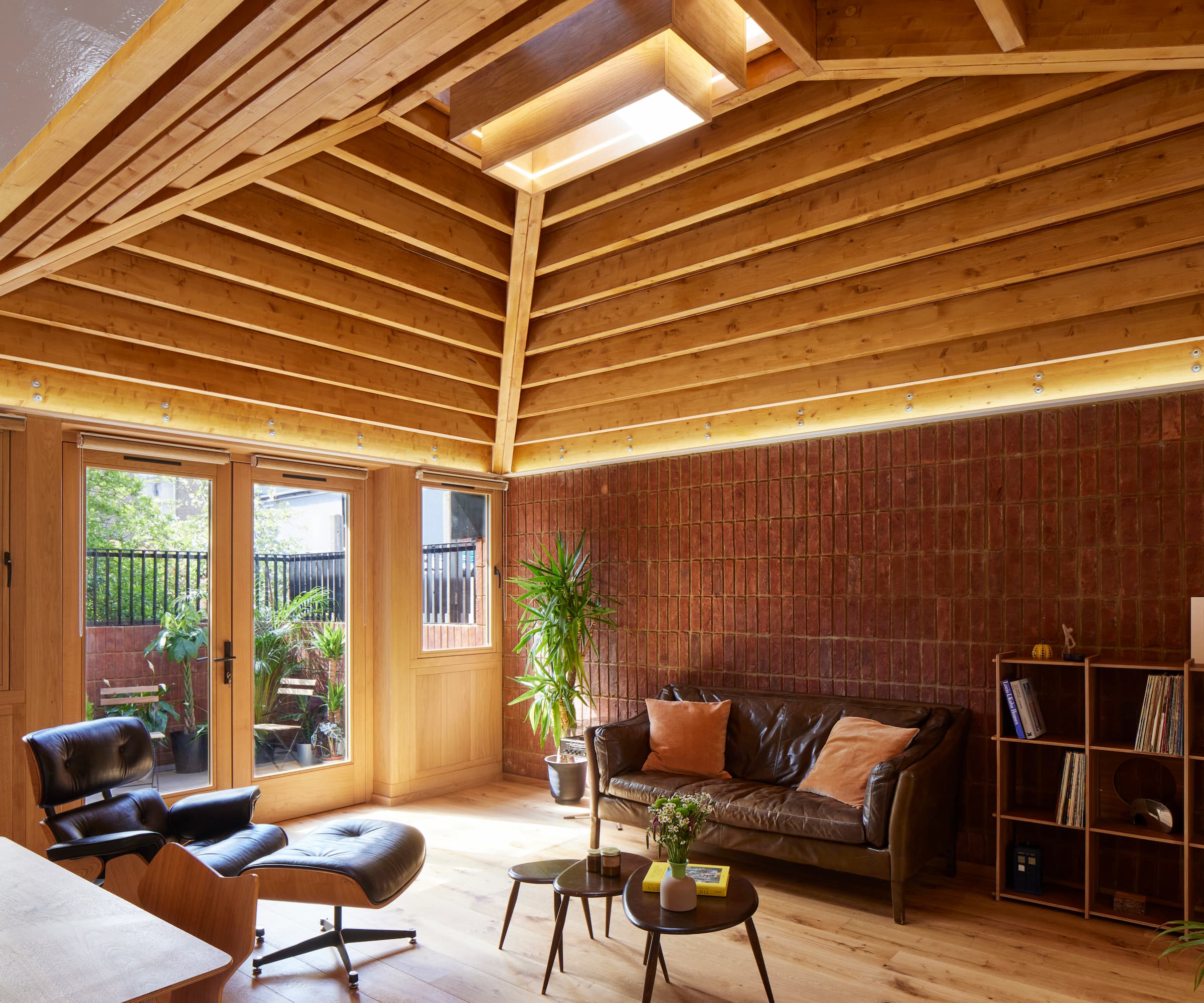 A pyramid roof structure made from wooden timber in a small self build home