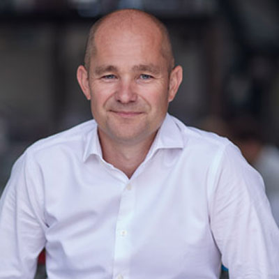 headshot of architect Mark Powels