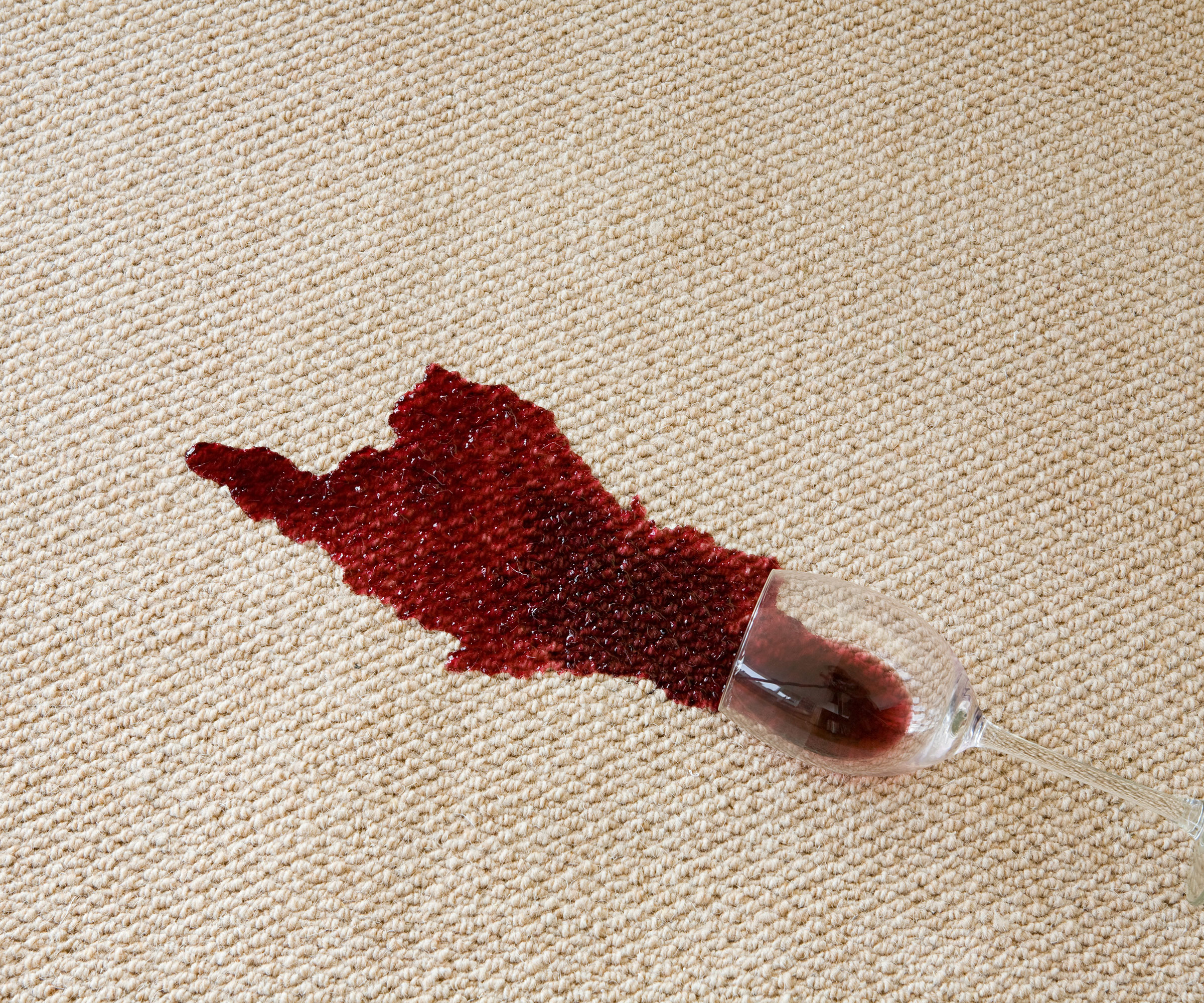 red wine spill on cream carpet