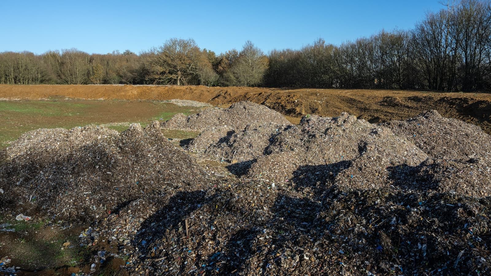 A huge pile of illegally dumped waste is seen on November 17, 2025 in Kidlington, United Kingdom