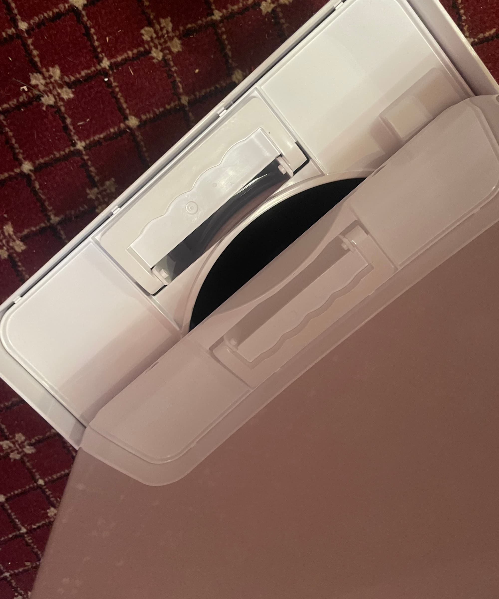 The pull out shelf of a Duux Bora Smart Dehumidifier