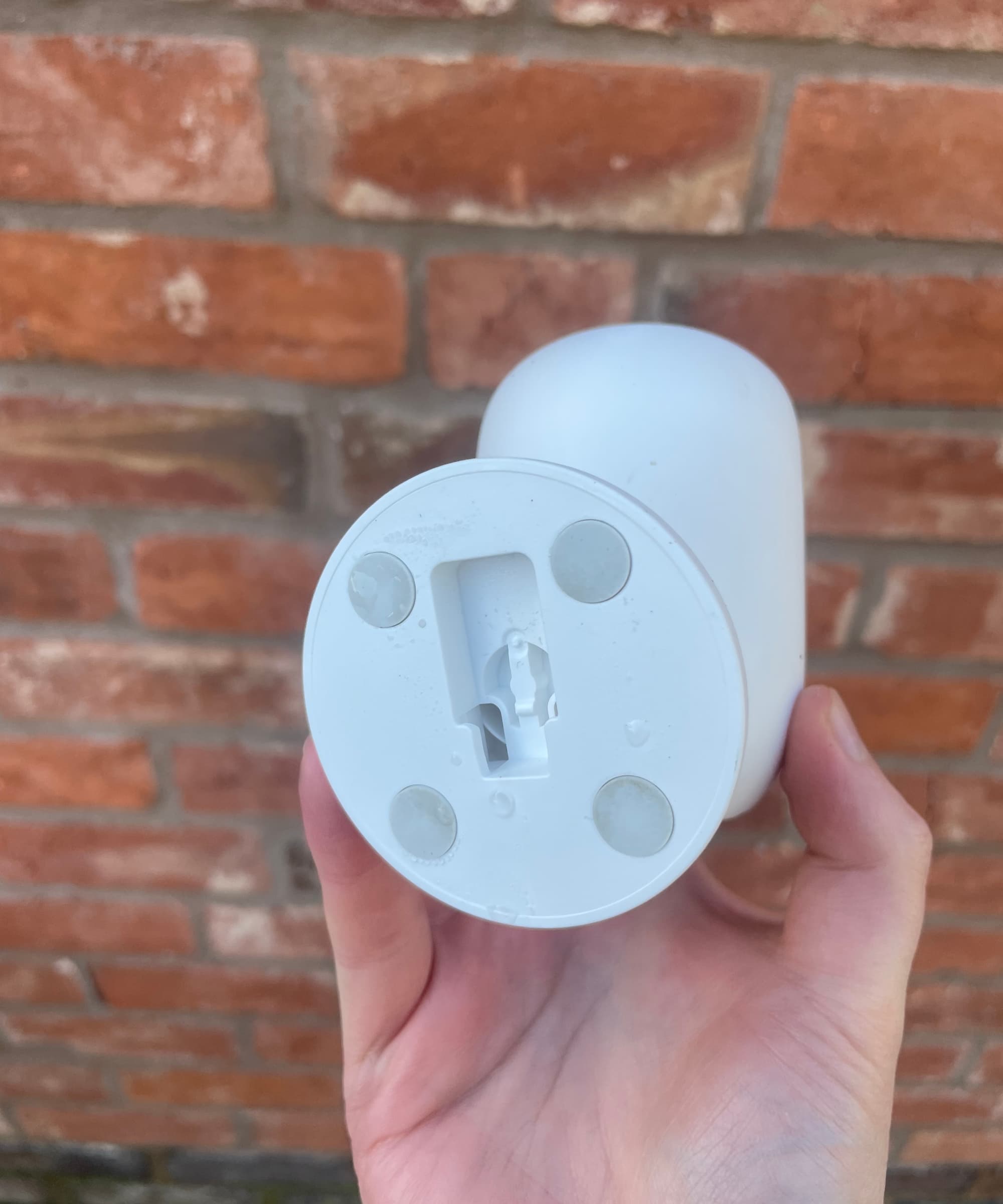 A eufy C35 camera with magnetic strips on the back