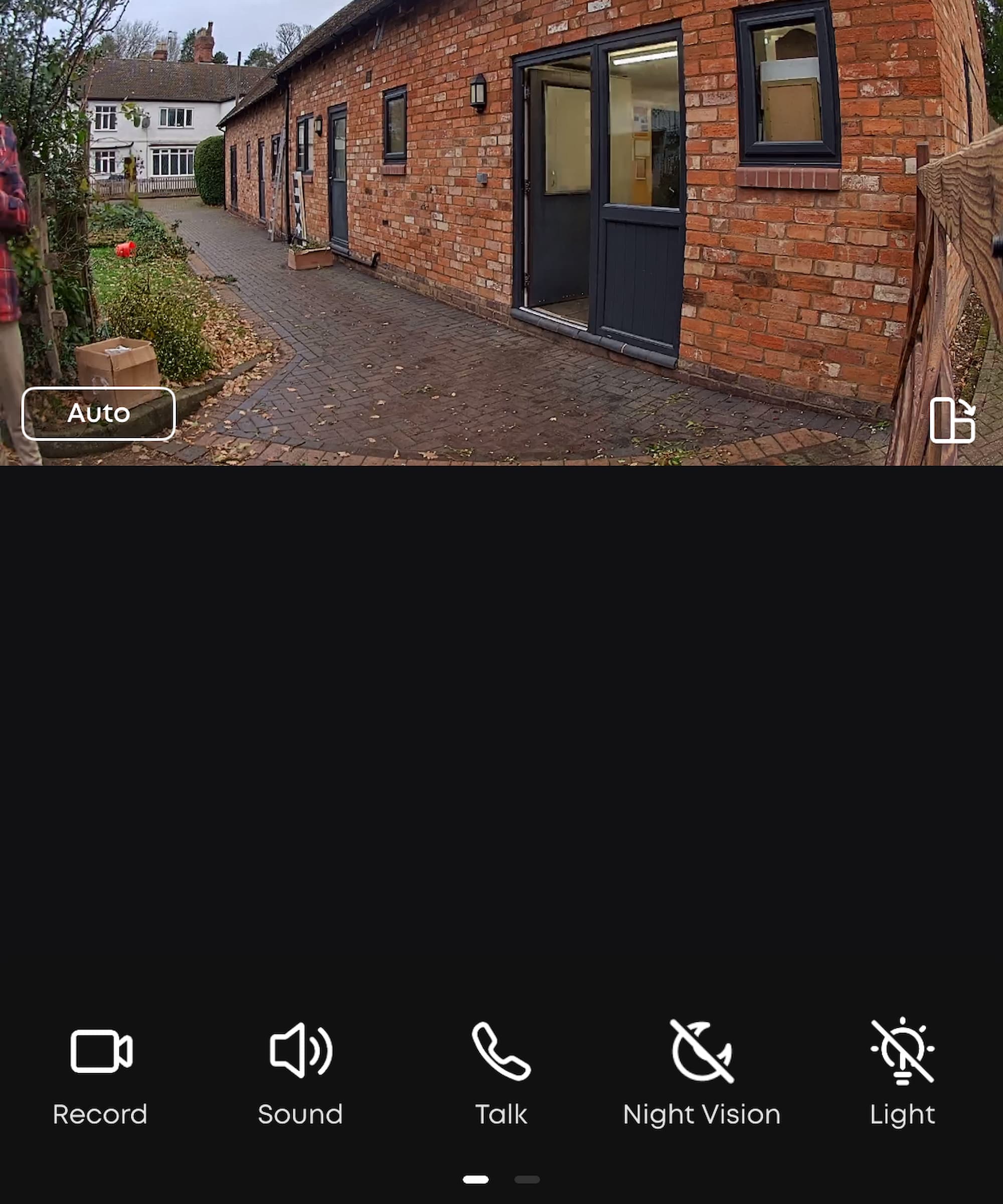 A eufy C35 camera view of a back door and garden