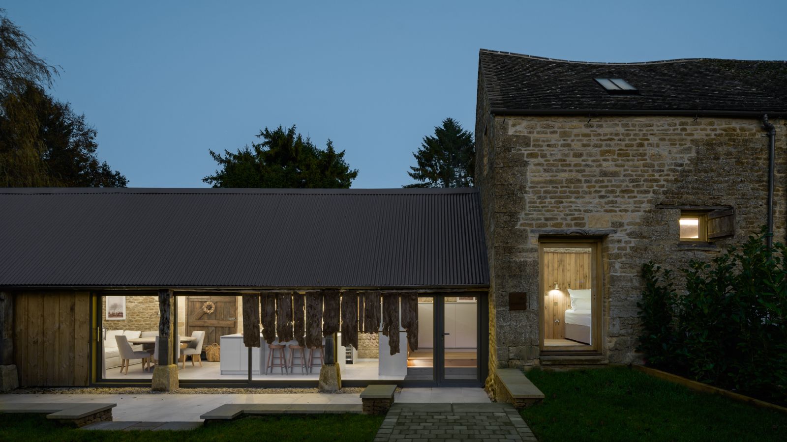 exterior of renovated listed barn and extension