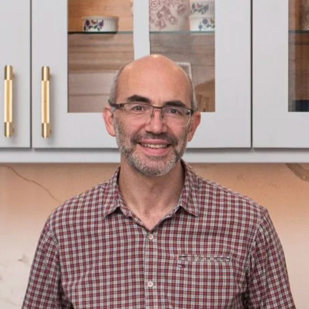 Heashot of Sebastian Aronowitz, Founder of The London Kitchen Company in a modern kitchen