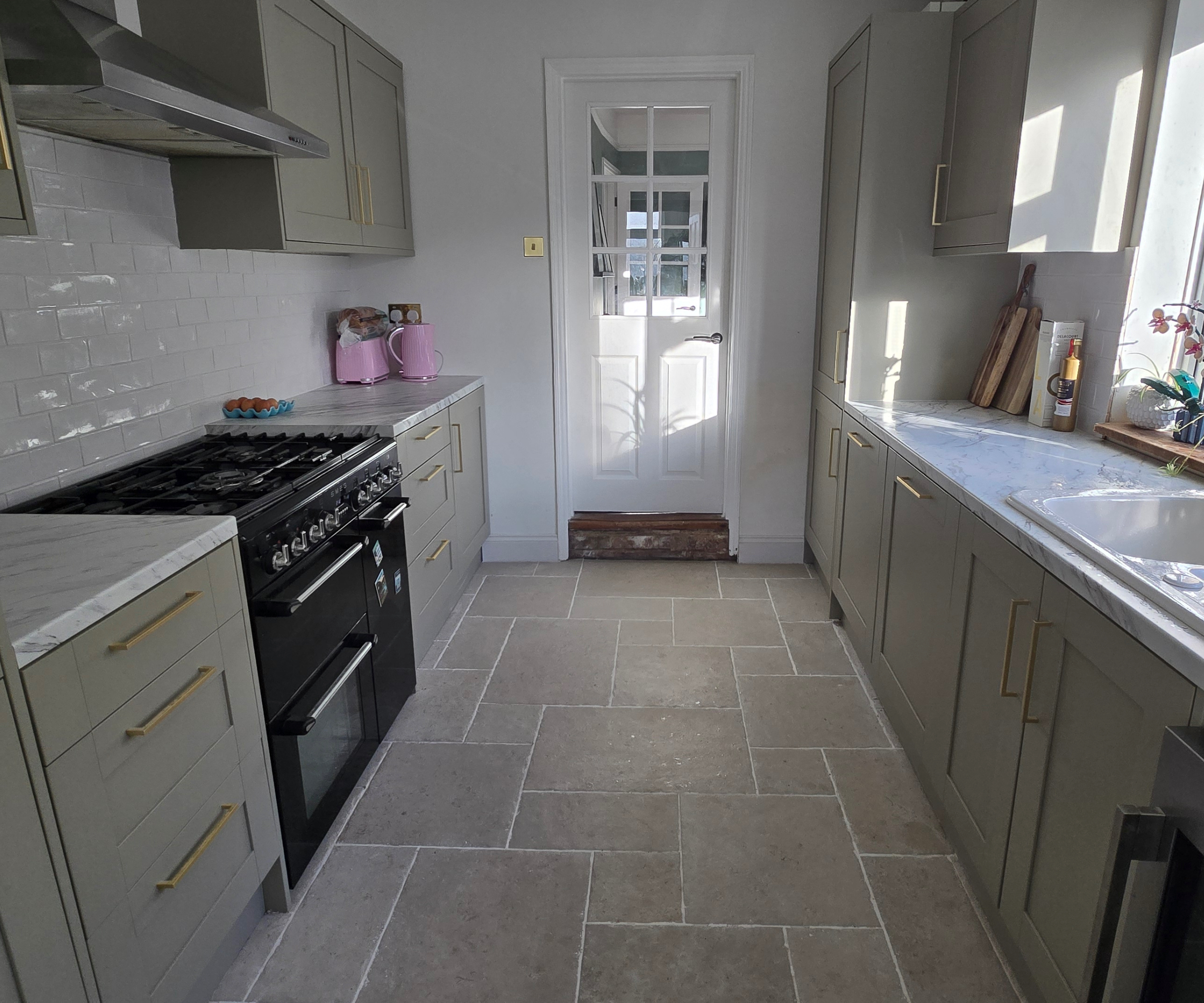 Wickes Ohio kitchen in green with marble look worktop