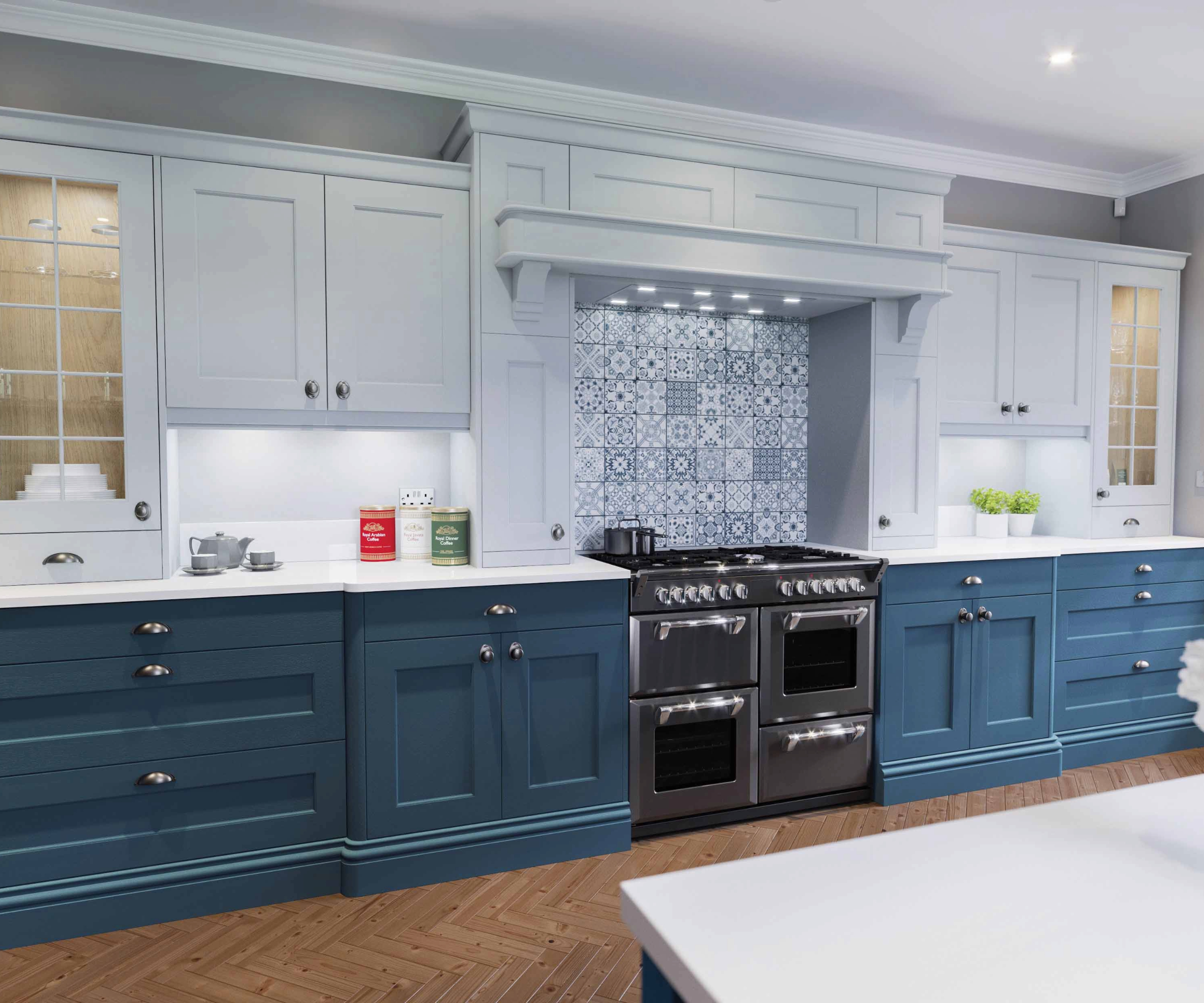 Kitchen with dark blue lower cabinets, light blue upper cabinets, and a mosaic splash back above the hob cooker