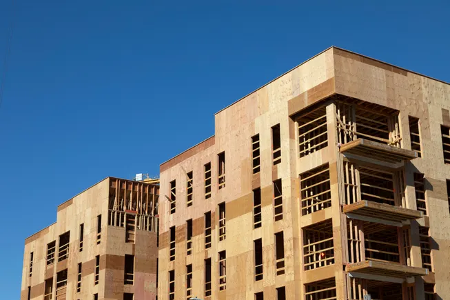 Multifamily starts tumble 26% | Construction Dive