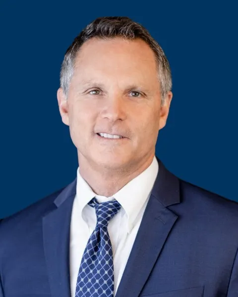 Headshots of Don Adair on the left and Chris Chany